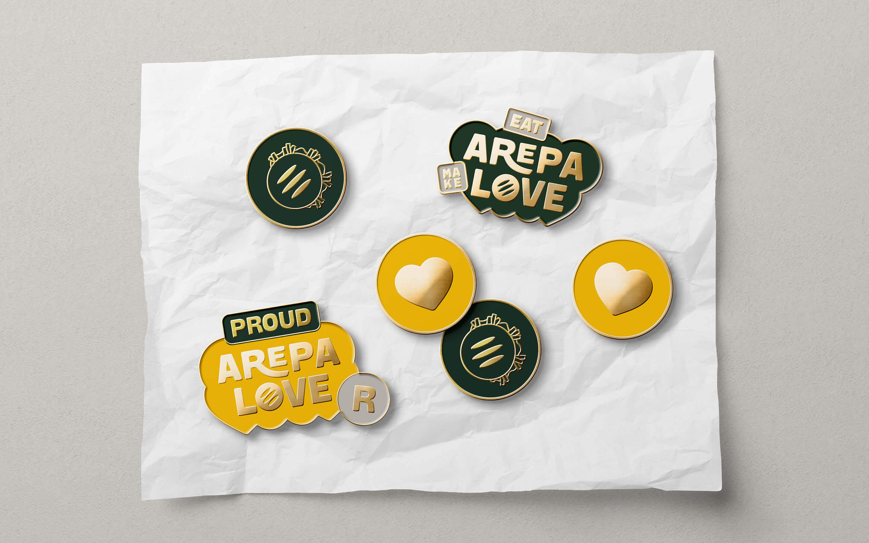 Arepa Love's custom enamel pins.